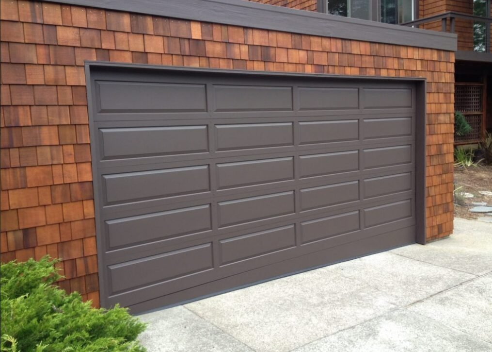 Professional techniciaperforming garage door repair at Whitehall Garage Door Repair, ensuring optimal functionality and safety for residential and commercial properties. Expert service for all garage door needs.