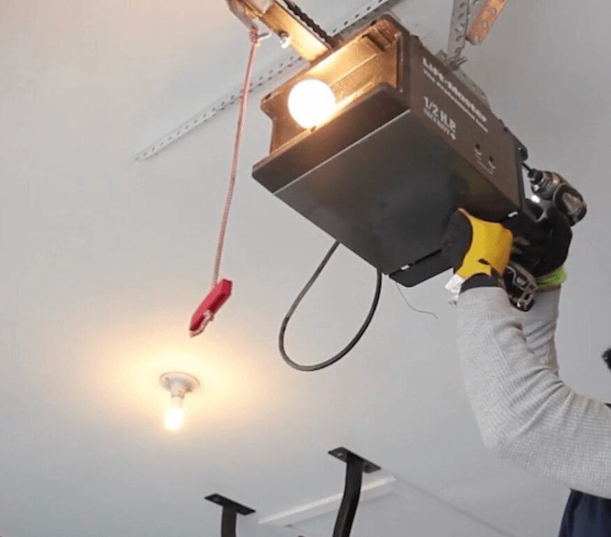 Technician performing garage door opener repair at Whitehall Garage Door Repair, ensuring smooth and reliable door operation.