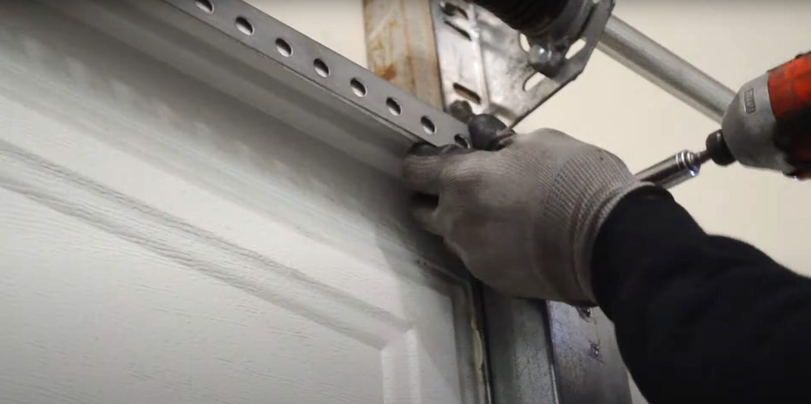 Off-track garage door realignment service on East Main Street, Columbus, OH